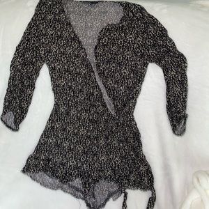 Black with tiny white floral print romper